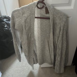 Grey again from the brand Canadian never been worn before